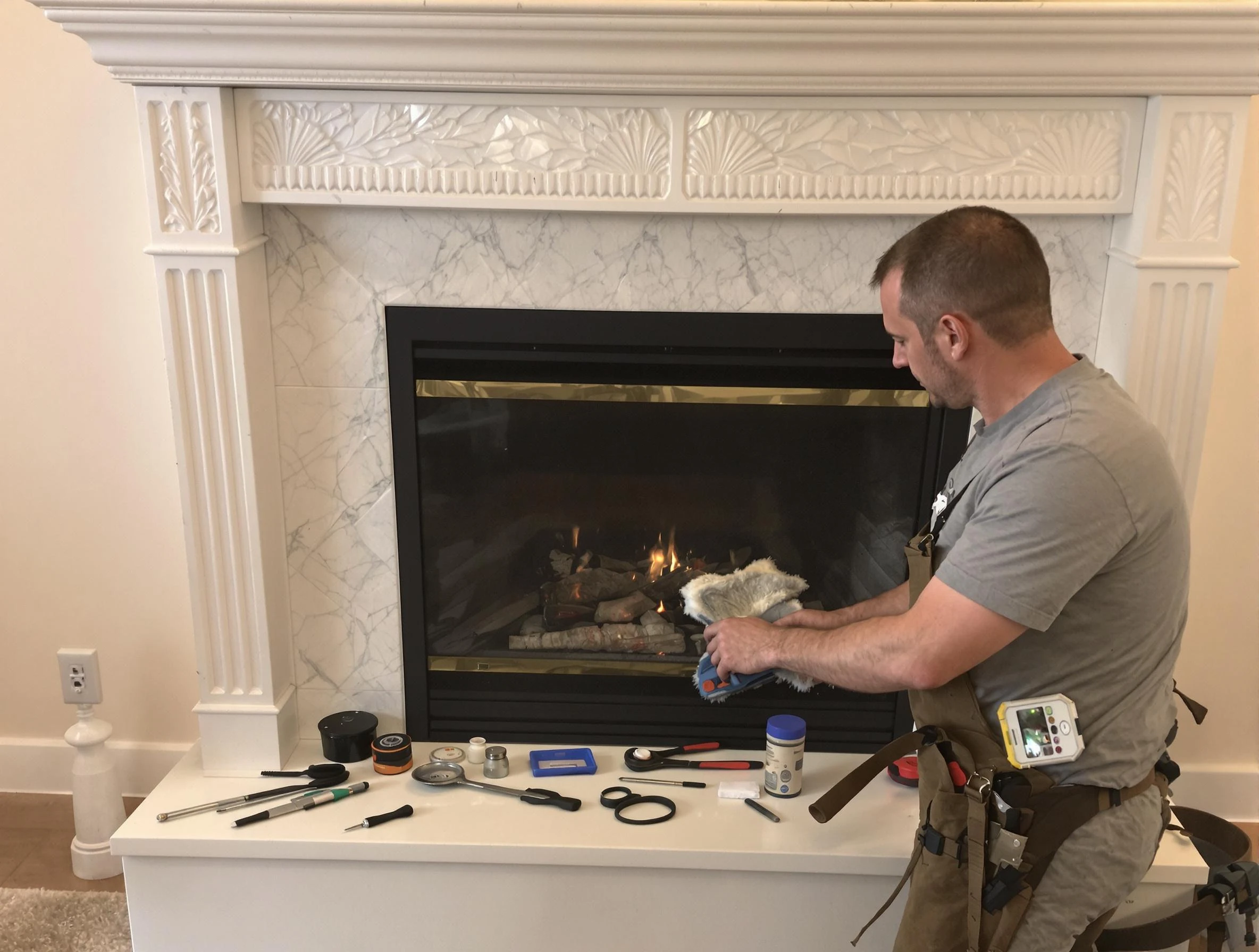 Boston Chimney Sweep performing fireplace maintenance in Boston, MA